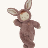 Olli Ella cozy dinkum bunny pickle doll in mauve colour, available at Babipur. This is a soft and fluffy doll with a sleeping face and cute floppy ears