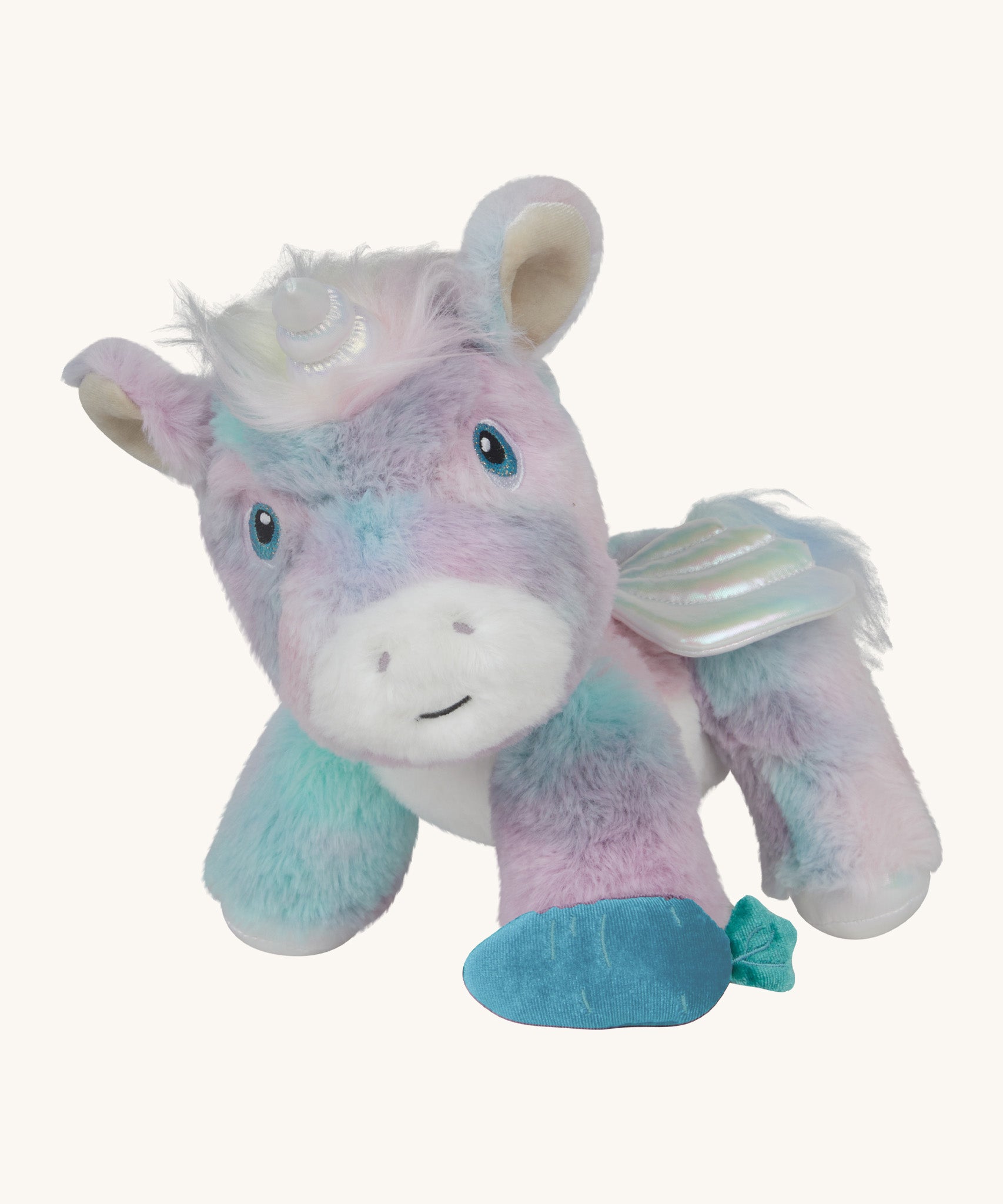 The Olli Ella dazzle unicorn dinkum doll. A soft and cuddly doll in light pastel colours. Features cute embroirdery facial features white pegasus wings and a unicorn horn.