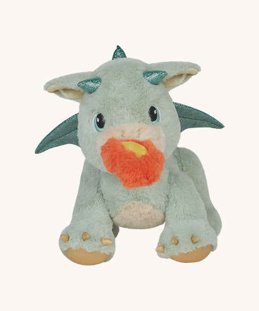 A Olli Ella dinkum dragon blaze doll  This light green fluffy doll has movable limbs and features green glittery wings and comes with a magnetic fluffy fire piece. This doll is available at Babipur.