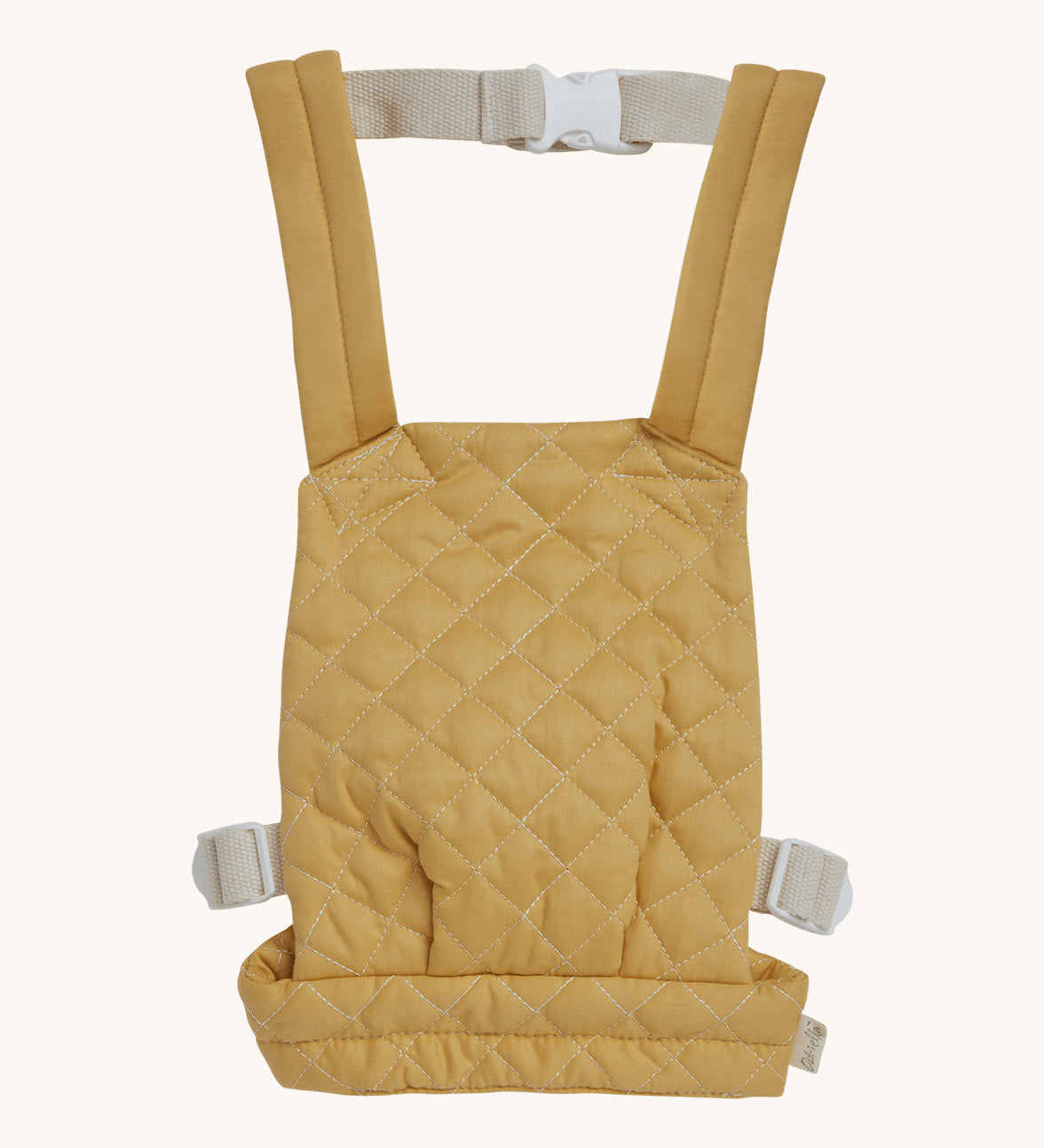 Olli Ella quilted toy carrier in honey available at Babipur. This dark yellow  toy carrier features a buckle on the back and side for a secured fit and can carry a Olli Ella diknum doll