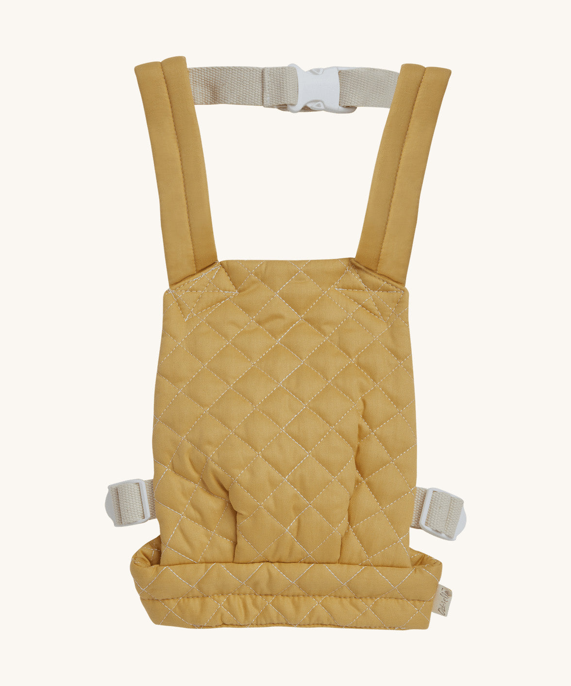 Olli Ella quilted toy carrier in honey available at Babipur. This dark yellow  toy carrier features a buckle on the back and side for a secured fit and can carry a Olli Ella diknum doll
