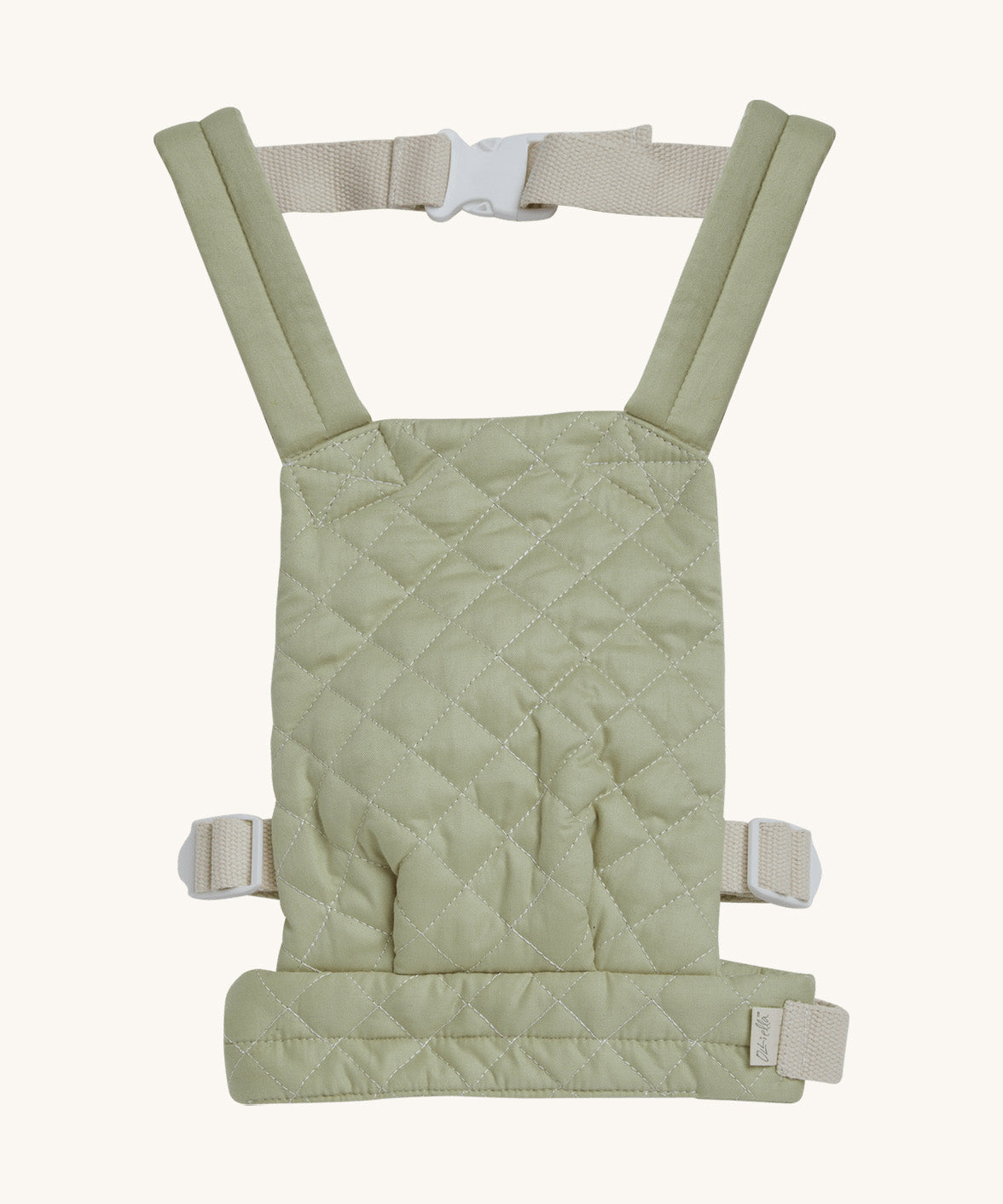 Olli Ella quilted toy carrier in sage available at Babipur. This pastel green toy carrier features a buckle on the back and side for a secured fit and can carry a Olli Ella diknum doll