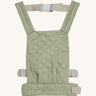Olli Ella quilted toy carrier in sage available at Babipur. This pastel green toy carrier features a buckle on the back and side for a secured fit and can carry a Olli Ella diknum doll