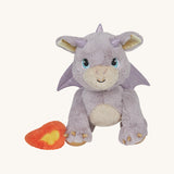 A light pink Olli Ella dinkum dragon blaze doll available at Babipur with the fluffy magnetic fire piece attached to the front paw. 