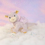 A Olli Ella dinkum dragon flare doll standing on a fully cloud. This light pink fluffy doll has movable limbs and features pink glittery wings. This doll is available at Babipur.