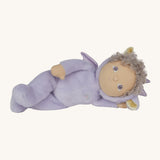 Olli Ella Dante the dragon dinky dinkum doll lying down. A lilac doll with matching curly hair and cute dragon ears. 