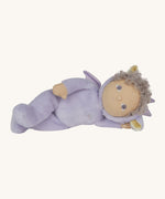 Olli Ella Dante the dragon dinky dinkum doll lying down. A lilac doll with matching curly hair and cute dragon ears. 