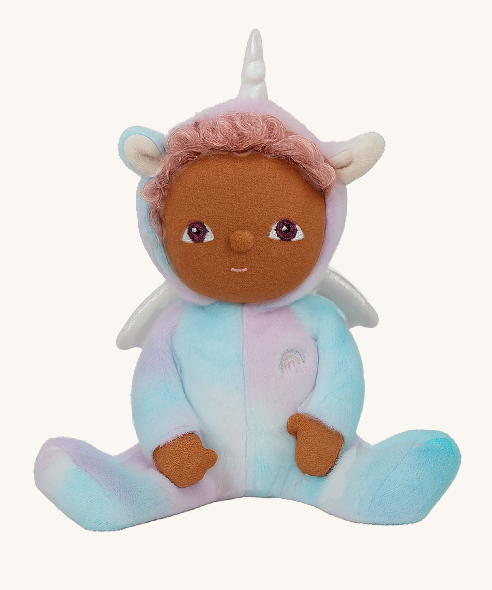 Olli Ella Uli the unicorn dinky dinkum doll available at Babipur. A soft and cuddly plush doll in pastel colours. Features white pegasus wings and a unicorn horn