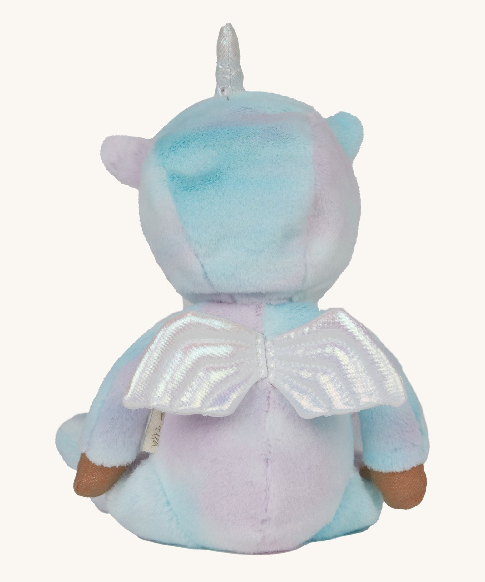 The back of the Olli Ella Uli the unicorn dinky dinkum doll available at Babipur showing the white pegasus wing detail