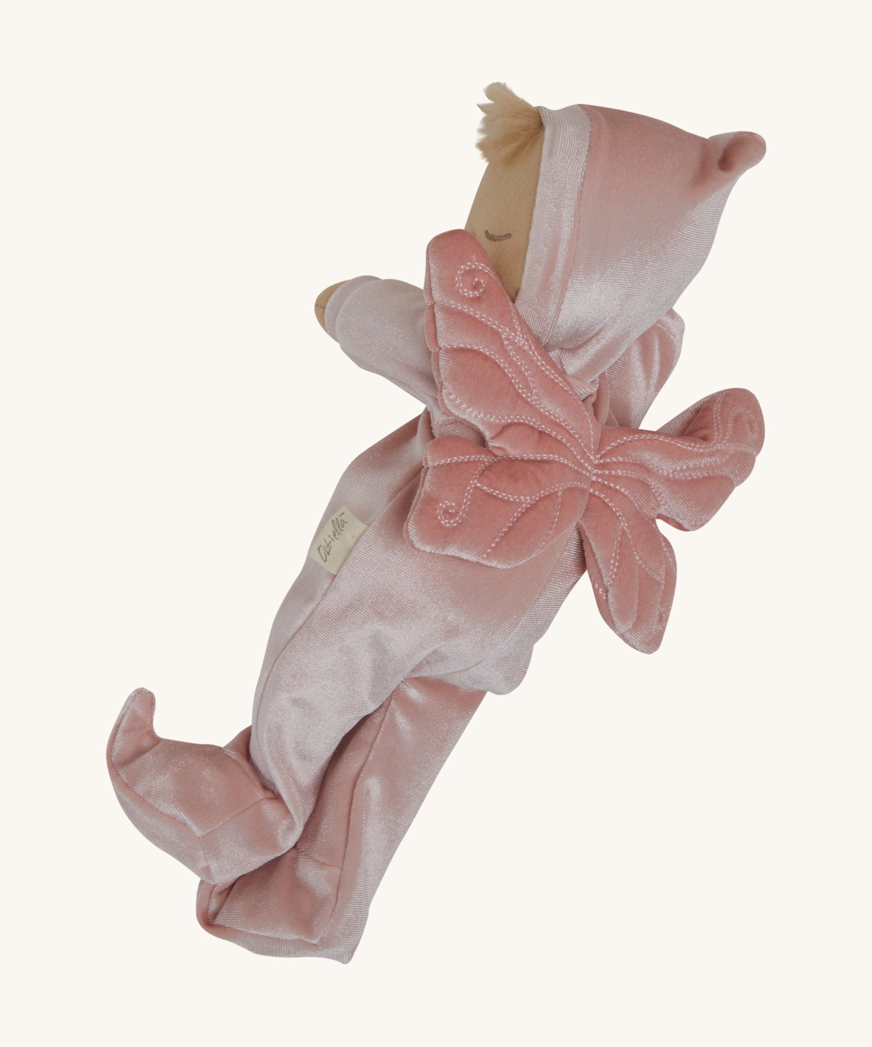 A side image of the Olli Ella Aurora fairy dozy dinkum doll available at Babipur. showing the stitching detail on the pink fairy wings