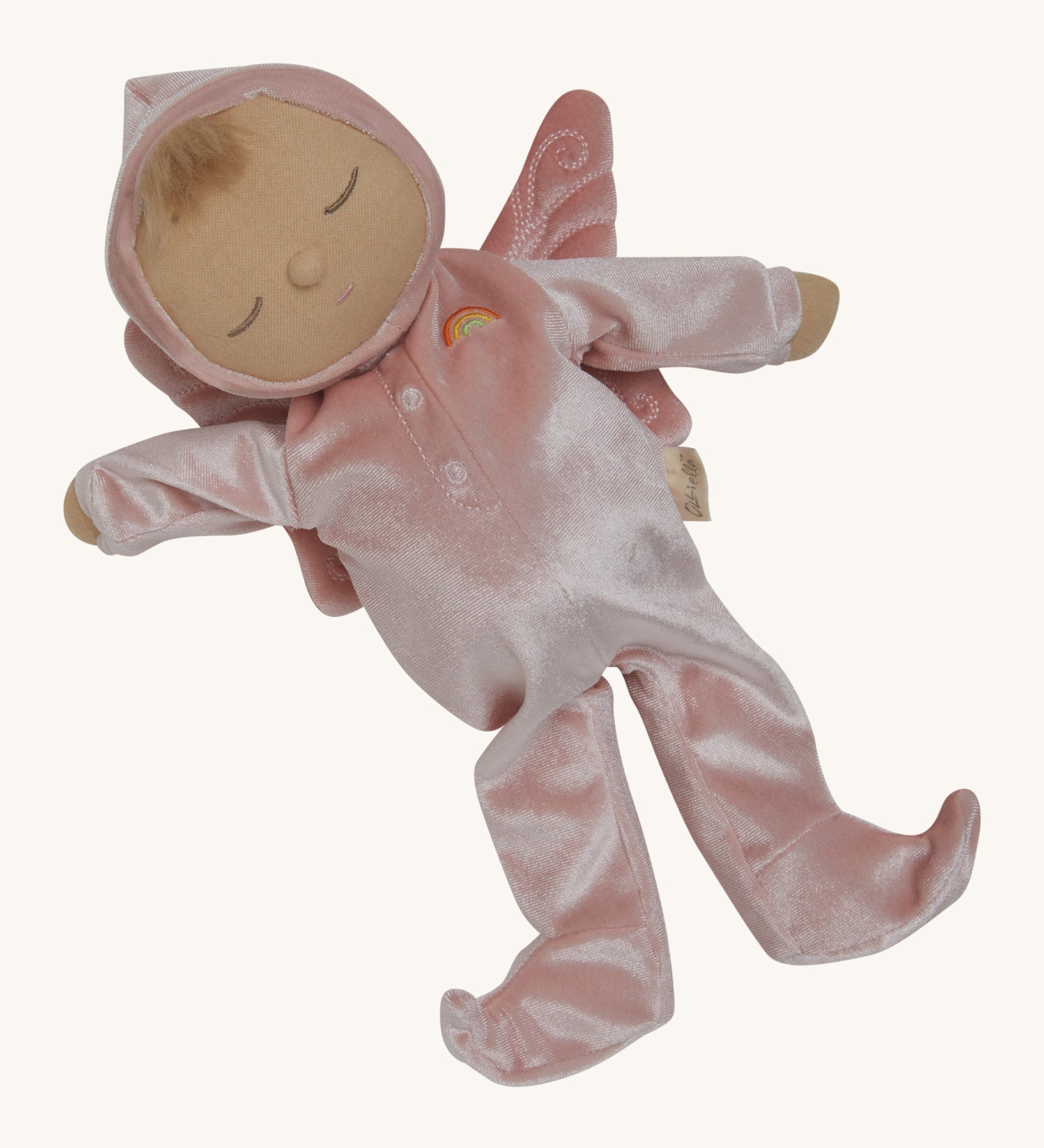 Olli Ella Aurora fairy dozy dinkum doll available at Babipur. A soft cuddly doll with a pink outfit and a sleepy face, Features a stitched button fastener detail and matching pink fairy wings