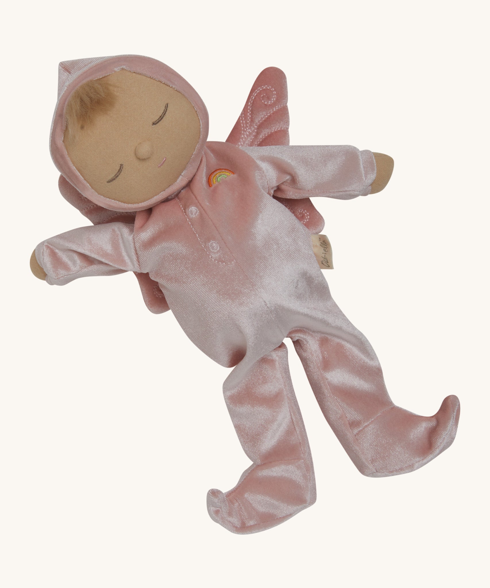 Olli Ella Aurora fairy dozy dinkum doll available at Babipur. A soft cuddly doll with a pink outfit and a sleepy face, Features a stitched button fastener detail and matching pink fairy wings