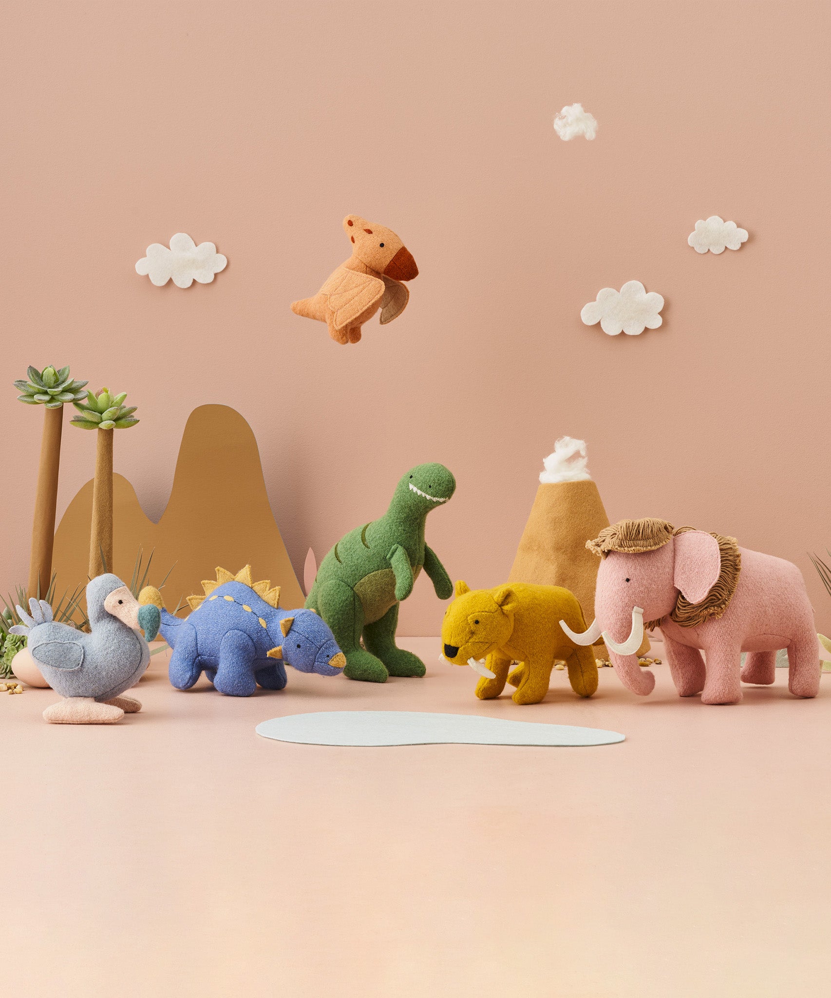 A group of soft stuffed animals: Mammoth, Dodo, Saber Tooth Tiger, Dinosaurs from the Olli Ella Holdie World Sets (Extinct Animals and Dinosaurs) for sale at Babipur.