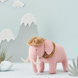 A pink wooly Mammoth plush toy from the Olli Ella Holdie World Extinct Animals Set,  buy now at Babipur.