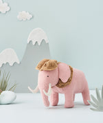 A pink wooly Mammoth plush toy from the Olli Ella Holdie World Extinct Animals Set,  buy now at Babipur.