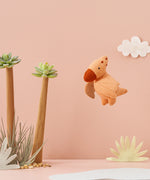 A pink flying Pterodactyl plush toy from the Olli Ella Holdie World Prehistoric Animals Dinosaurs, buy now at Babipur.