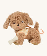 Olli Ella Dinkum Dog - Goldie. A lovely soft plush dog in light brown with brown eyes. This Dinkum Dog come with a coral and peach harness and a plush toy bone.