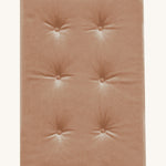 A soft, velvet Olli Ella Strolley mattress perfect for keeping any doll comfy in a Strolley. This mattress is in Champagne colour and is on a cream background