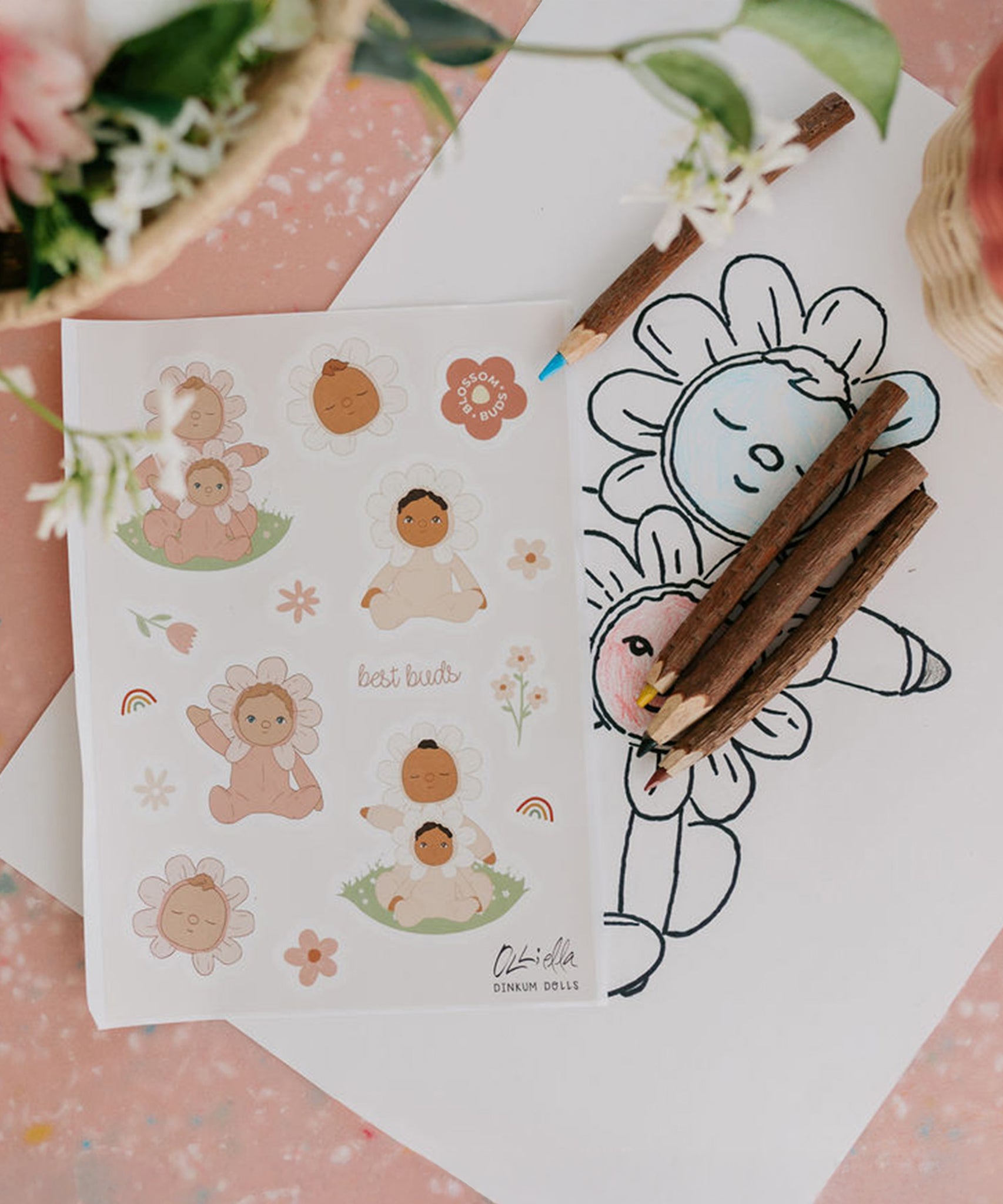 The stickers from the Olli Ella Limited Edition Blossom Buds Gift Set - Tulip, on a table with Olli Ella pencils and an Olli Ella Blossom Buds drawing