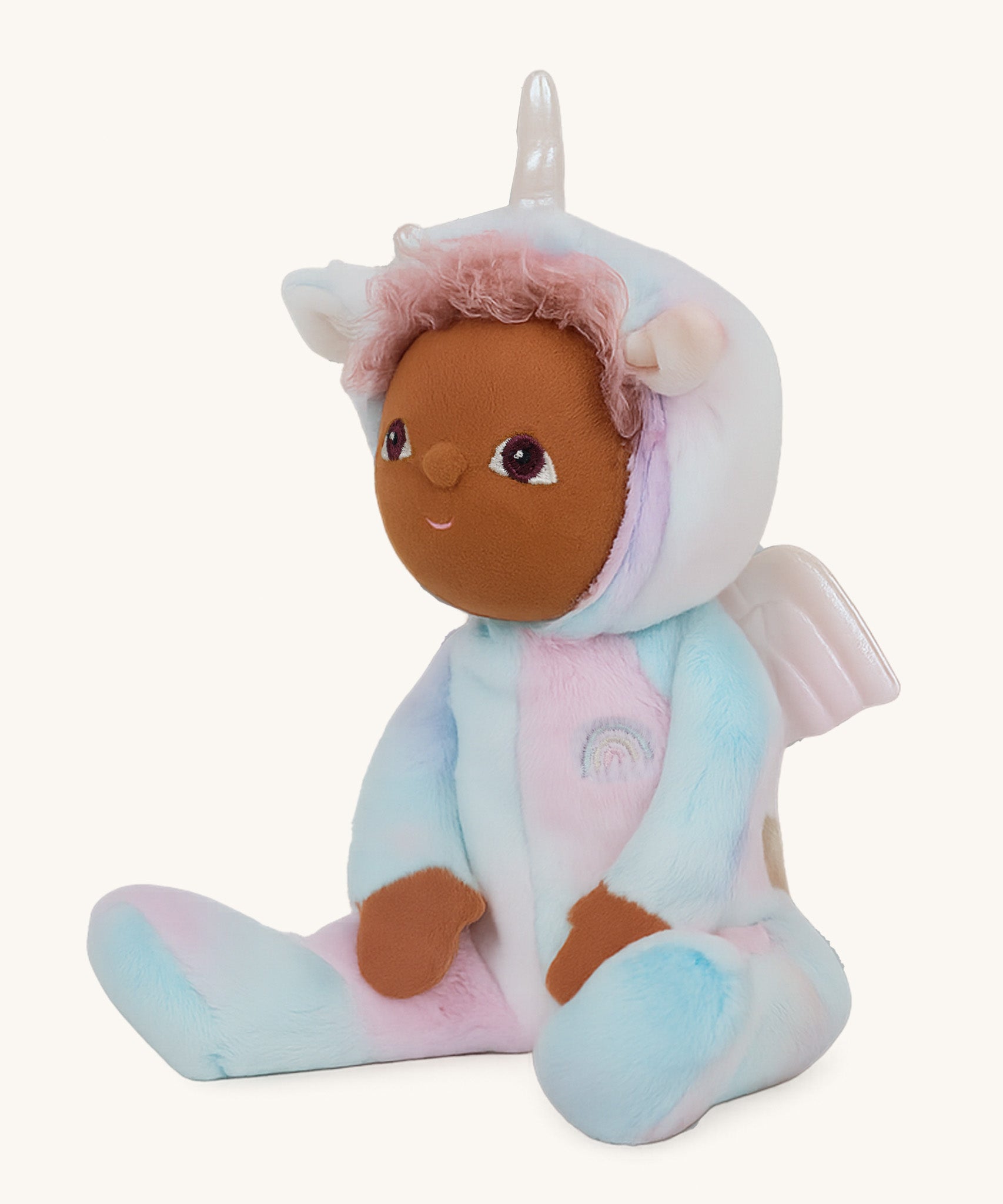 A side image of the Olli Ella Uli the unicorn dinky dinkum doll available at Babipur showing the cute playful embroidery facial detail