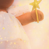 A close up of the golden wand held by the Olli Ella Freya dream dinkum doll