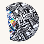 Etta Loves x Camille Walala Reversible Playmat. One side is in a monochromatic shape design, the other is in a colourful shape design