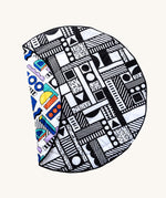 Etta Loves x Camille Walala Reversible Playmat. One side is in a monochromatic shape design, the other is in a colourful shape design