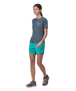 A person wearing the Patagonia Women's Capilene Cool Trail Graphic Shirt