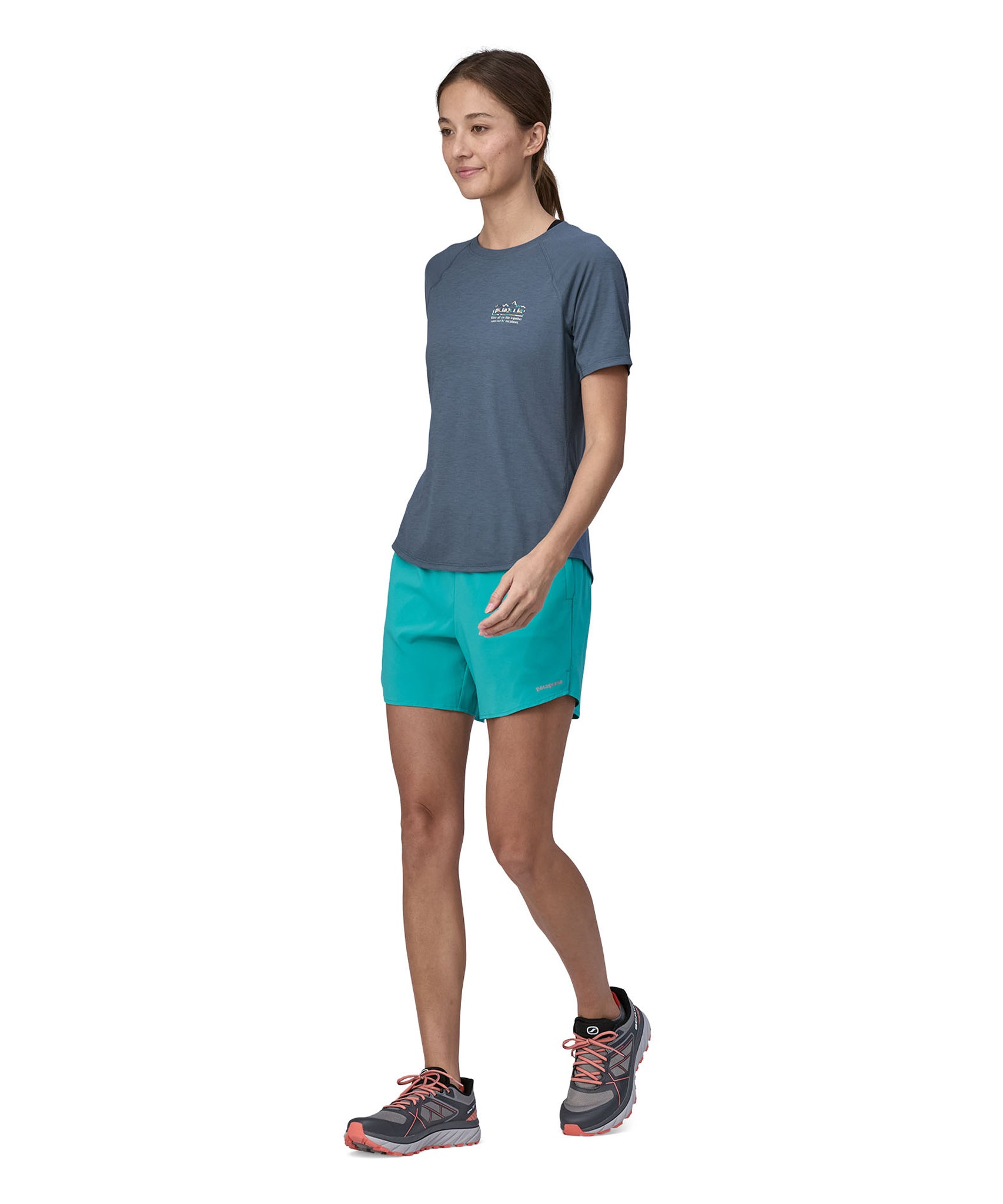 A person wearing the Patagonia Women's Capilene Cool Trail Graphic Shirt