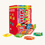 Tony's Chocolonely Fairtrade, Organic Tiny Tony's Rainbow Mix is a rainbow stripe box with 100 individually wrapped milk chocolate buttons in rainbow wrapping. The image shows the box open at the bottom, with individual wrapped chocolates scattered in front of the box. The image is on a cream background