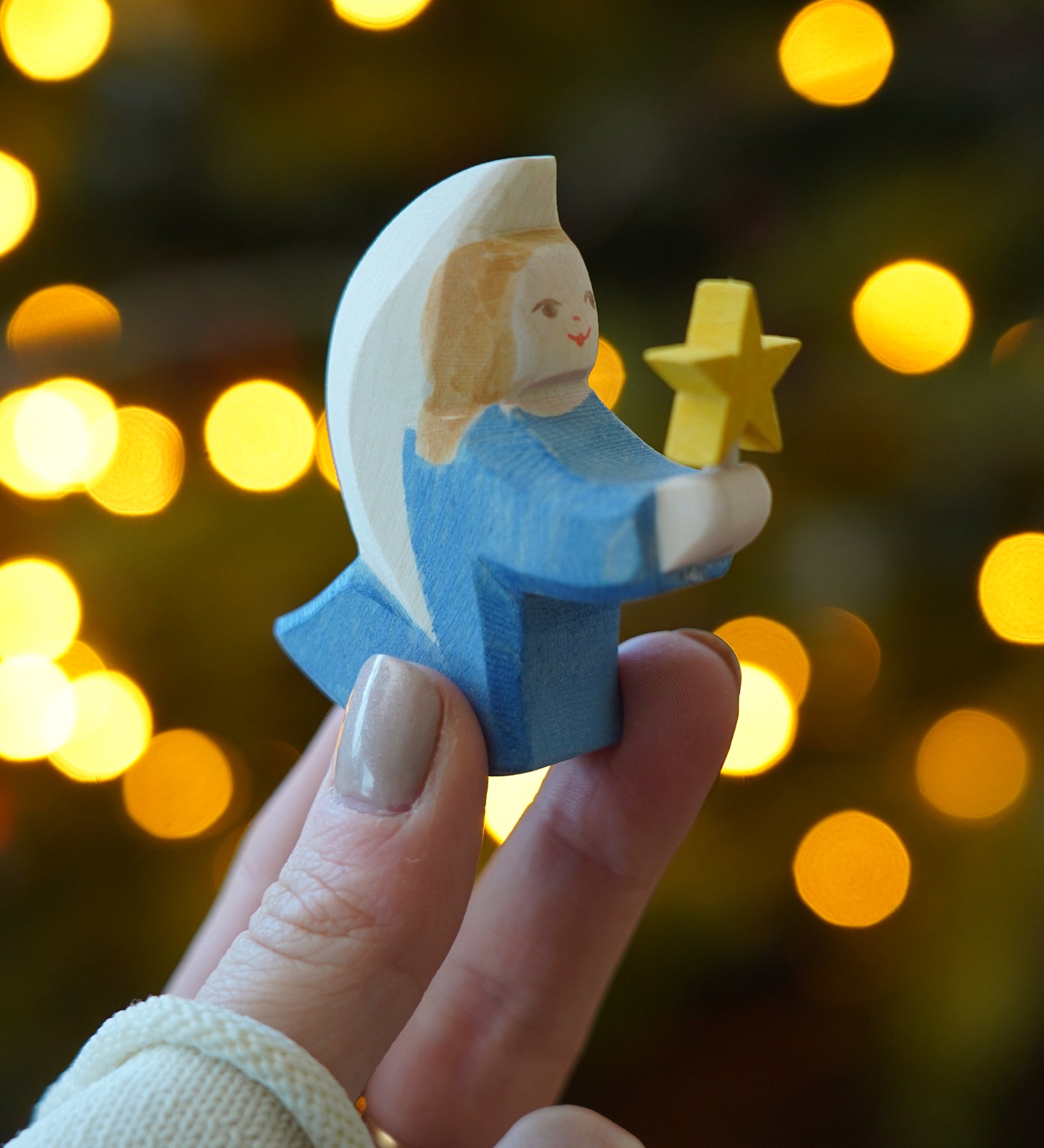Blue Ostheimer Wooden Angel with yellow star, a Christmas or nativity figure for displays or play, buy now at Babipur.