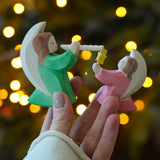 Ostheimer Angels, green with flue and pink with star - wooden rocking angel toy figures, available to buy at Babipur.