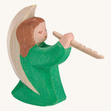 A Ostheimer wooden angel figure playing a flute, available at Babipur. This handmade and hand painted festive figure has a green dress and brown hair.
