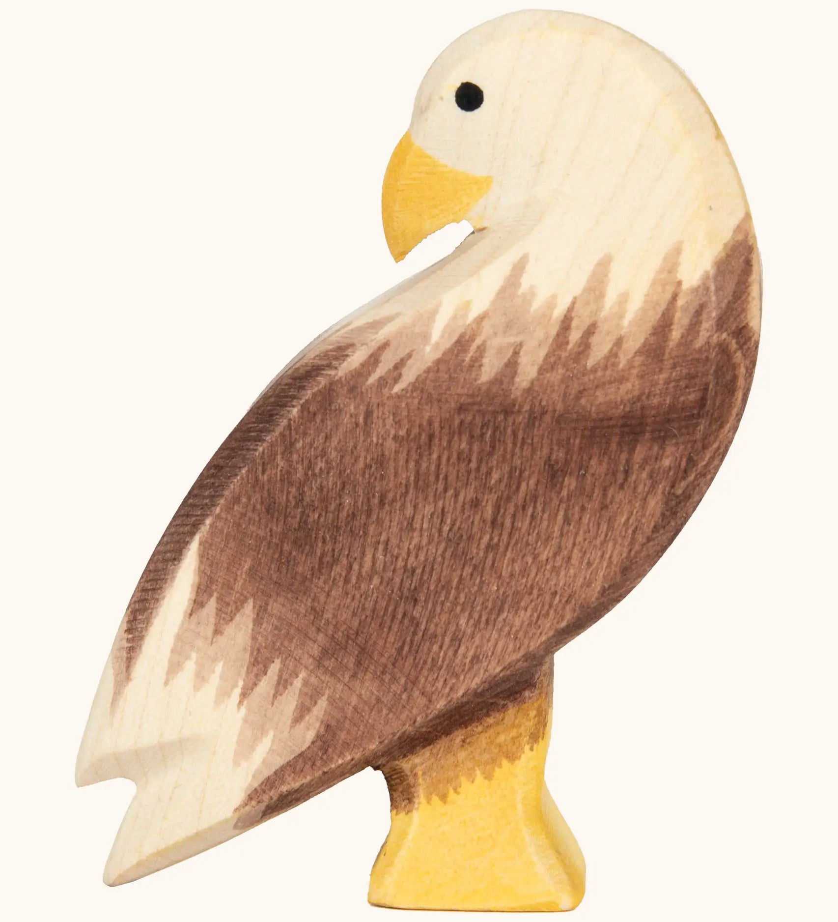 Ostheimer handcrafted wooden standing bald eagle figure with hand painted brown body and unpainted head.