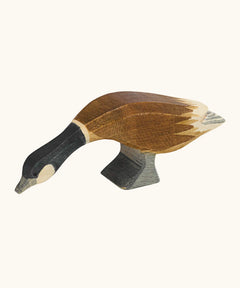 Ostheimer handcrafted wooden Canada goose figure with long neck. Handpainted brown body and navy neck