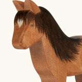 Hand painted facial features and hair on the Ostheimer wooden Hrokur the horse  figure