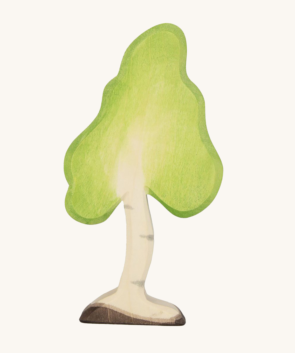 Ostheimer Small Wooden Birch Tree, handmade and hand crafted with a light green painted top to represent leaves, and painted bark and trunk detail. The smooth natural wood grain shows through making the tree more realistic. The tree is on a cream backgroud