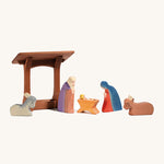 Ostheimer wooden manger toy with Christmas nativity figures and animals stood together. The perfect nativity scene