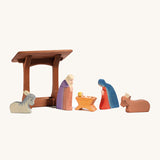 Ostheimer wooden manger toy with Christmas nativity figures and animals stood together. The perfect nativity scene