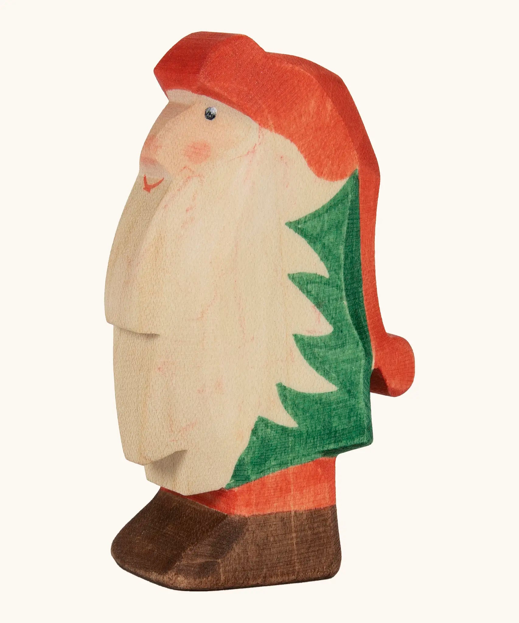 Ostheimer hand crafted Norbet winter gnome figure with hand painted green outfit red hat and unpainted beard