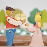 Ostheimer Rider and Princess wooden toy figures, handmade in Germany, exchanging a small round round, Waldorf and small world play scene, sold at Babipur