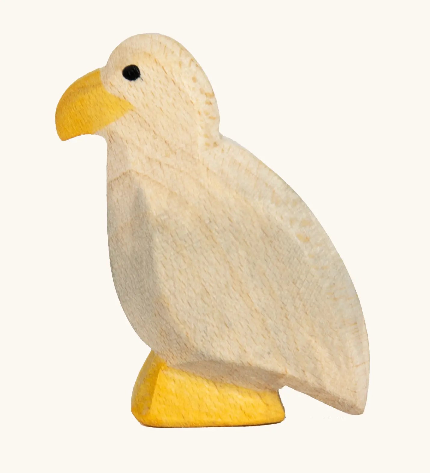 Ostheimer handcrafted wooden small bald eagle figure with unpainted body and hand painted yellow beak and feet