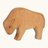 Ostheimer hand crafted wooden small bison figure with handpainted light brown body and black facial features