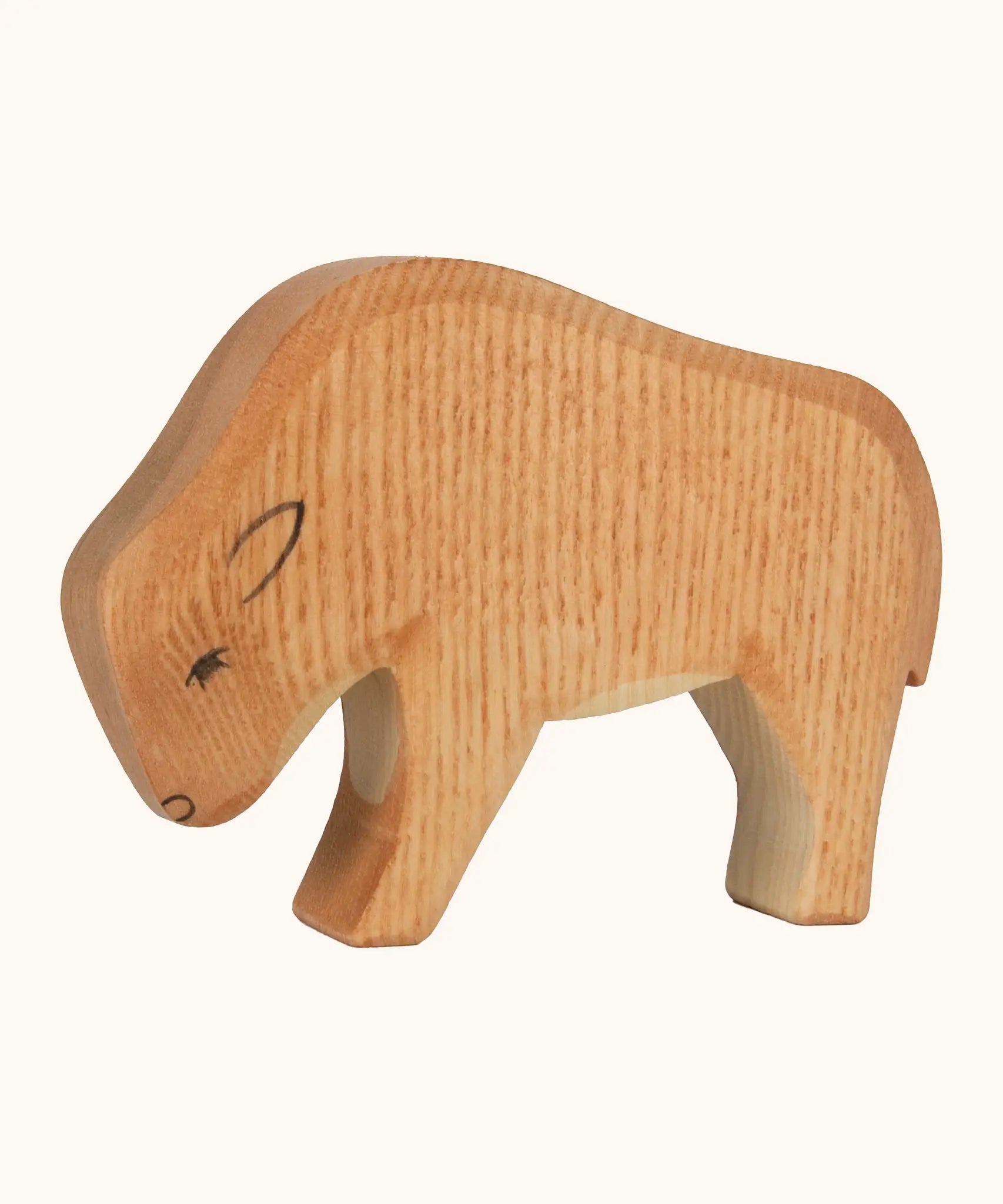 Ostheimer hand crafted wooden small bison figure with handpainted light brown body and black facial features