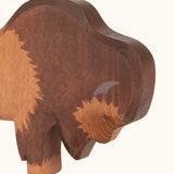 Hand painted facial features on the Ostheimer wooden bison figure