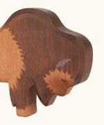 Hand painted facial features on the Ostheimer wooden bison figure
