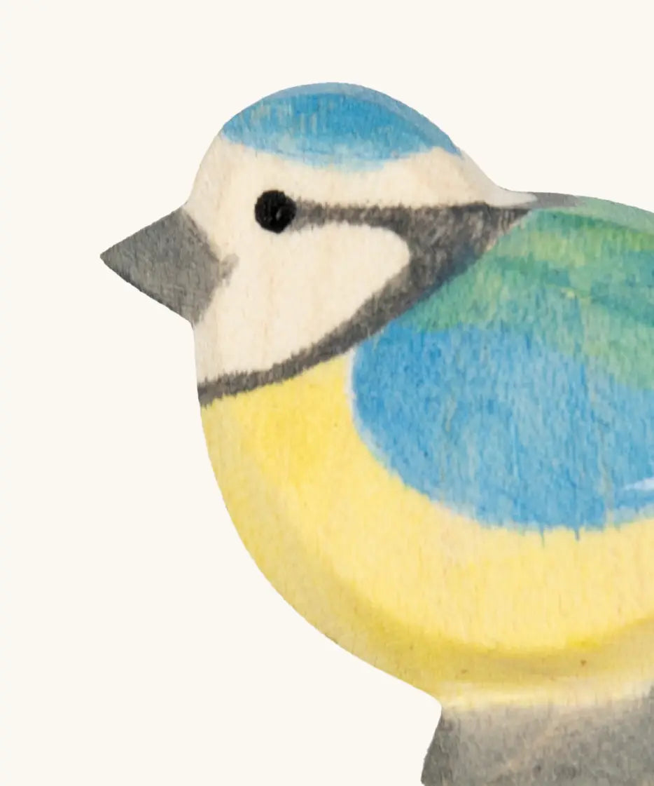 Hand painted facial features on the Ostheimer wooden blue tit bird figure