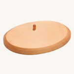 The natural wooden base support of the palm trees, with a wooden dowel towards the top of the base