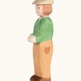 Ostheimer handcrafted wooden young farmer figure with hand painted green coat, brown trousers and flat cap