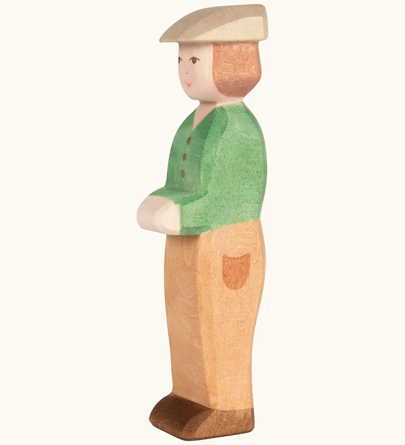 Ostheimer handcrafted wooden young farmer figure with hand painted green coat, brown trousers and flat cap